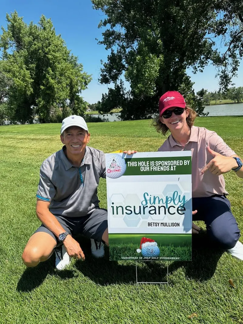 Simply Insurance hole sponsor sign at the Christmas in July Golf Tournament